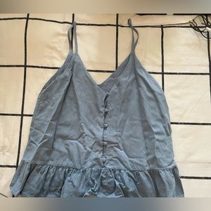 Light blue top by Vestique. Buttons down the front!